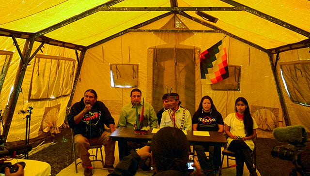 A press conference (from left to right) Tom Goldtooth of the Indigenous Environmental Network, Standing Rock Chairman Dave Archambault II, Ecuadorian environmental and indigenous rights activist Franco Viteri, Kandi Mossett of the Indigenous Environmental Network and Ecuadorian environmental and indigenous rights activist Nina Gualinga, Sept. 14, 2016. (Photo: Sarah Jaffe / BillMoyers.com)