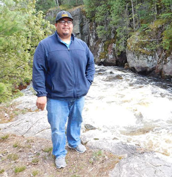 Guy Reiter on the Menominee Reservation in May. (Photo: Environmental Health News)