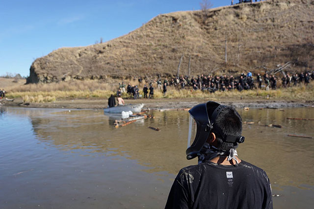 Water Protectors take to the water on Sunday. (Photo: Johnny Dangers)