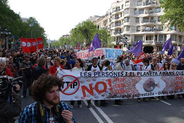 Public outrage over NAFTA dispute resolutions favoring corporations over people and the environment helped catalyze opposition to other trade agreements. A protest in Barcelona, Spain against the still being negotiated TTIP. (Photo by horrapics licensed under the Creative Commons Attribution 2.0 Generic license)