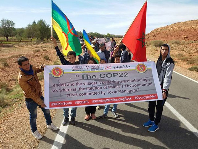 Indigenous protesters in Morocco have accused their government of using the COP22 climate talks to draw attention away from the environmental destruction that a silver mining corporation is wreaking 300 km south of the talks, in the town of Imider. (Photo: Nadir Bouhmouch)