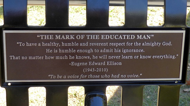 The memorial bench that was dedicated to police violence victim Eugene Ellison on November 4, 2016, bears this inscription in his memory. 