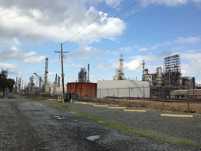 A parking lot next to a refinery in Norco, Louisiana, between New Orleans and Baton Rouge. Accidents occur at on a daily basis in Louisiana's expansive oil and gas industry, and environmentalists say aging infrastructure and faulty equipment is often to blame. (Photo: Mike Ludwig) 