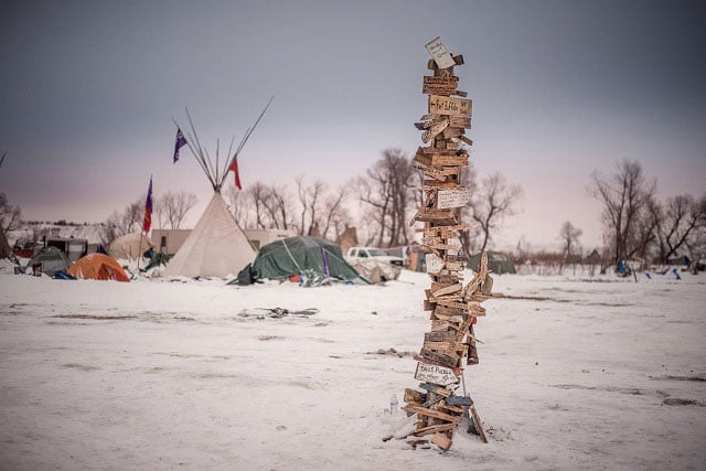 Above, horseback sentinels on the hilltop above the encampments. (Photo: Joseph Zummo)