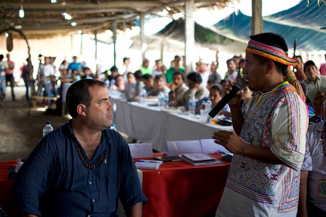 Indigenous leader James Rodriguez Acho speaking during the debate alongside Peru’s Minister of Production Bruno Giuffra (Photo: Sophie Pinchetti)
