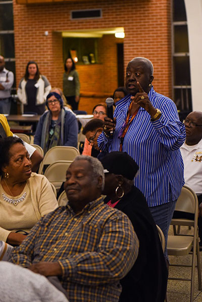 A Ninth Ward community member disparages the Florida Avenue Roadway project. (Photo: Michael Stein)