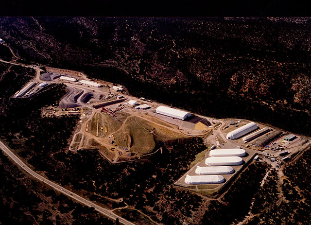 Aerial shot of Area G at Los Alamos National Laboratory, New Mexico, where some experts estimate that as much as 350,000 cubic meters of toxic and radioactive waste is buried in unlined pits, waiting to be capped. (Photo: Trish Williams-Mello, Los Alamos Study Group)