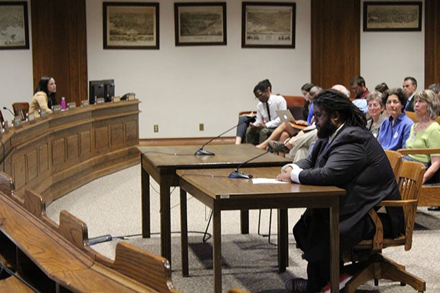 John Berg Powers, an advocate from Worcester, testifies about racial disparities in the US health system to Massachusetts legislators at a hearing for single-payer health care. (Photo: Rebecca Klein / MassCare)