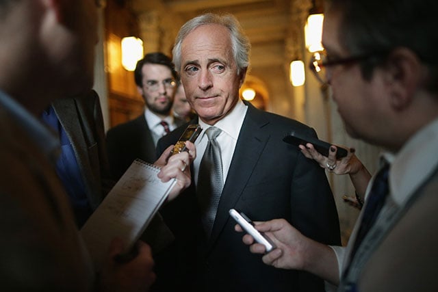 Sen. Bob Corker (R-TN) talks with reporters before attending the weekly Republican Senate caucus policy luncheon at the U.S. Capitol, November 5, 2013 in Washington, DC. Corker has informed the Secretary of State that future weapons sales to Persian Gulf coast countries will face more restrictions. (Photo: Chip Somodevilla / Getty Images)