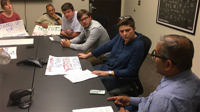 Hoosier Action meeting with Hodge Patel, Donnelly's state director, telling him our stories and demands. (Photo: Courtesy of Hoosier Action)