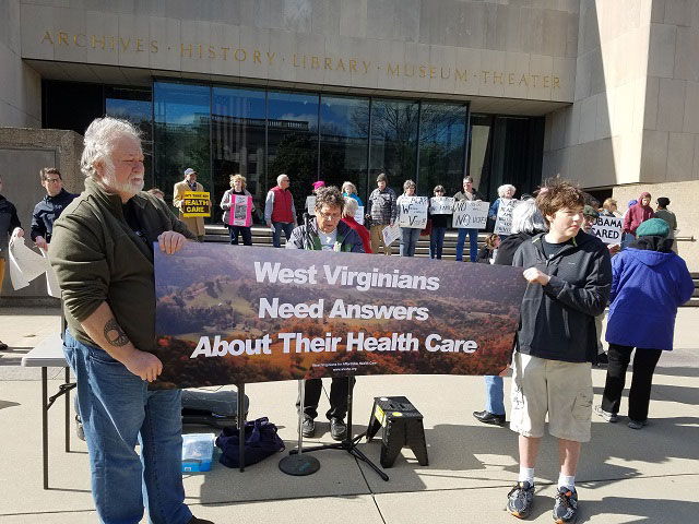 West Virginians assemble at the state capitol in late winter, holding a rally for answers on what's in the GOP health care bill. (Photo courtesy of Gary Zuckett)