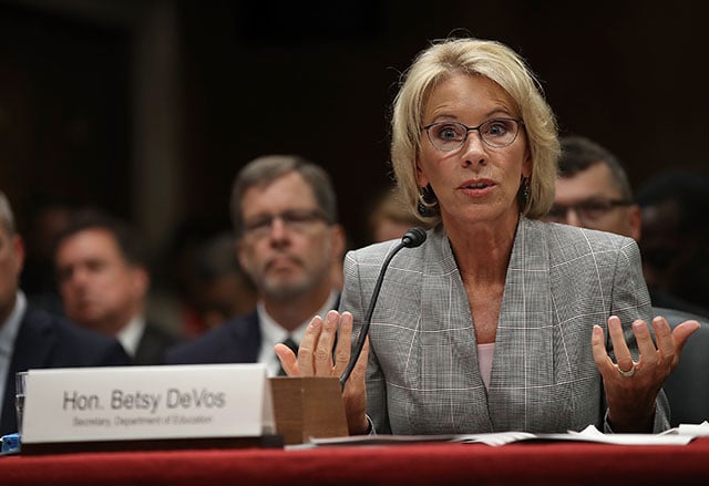 Education Secretary Betsy DeVos testifies before the Senate Appropriations Committee on Capitol Hill June 6, 2017 in Washington, DC. Student loan servicers are engaged in economic terrorism, and DeVos is only making it worse. (Photo: Win McNamee / Getty Images)