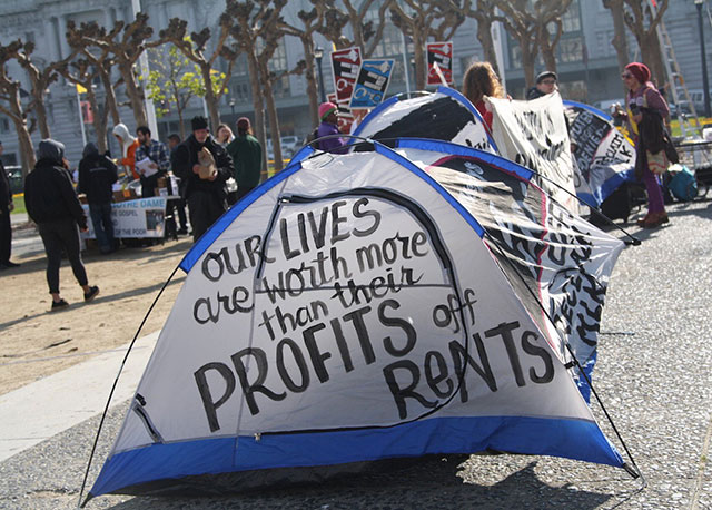 People didn't create homelessness, but are blamed for it, said Bilal Ali, organizer at the Coalition for the Homelessness, at the homeless people's assembly. We are not afraid of Donald Trump. We have to organize or die. People bring change. (Photo: Rucha Chitnis © The Oakland Institute)