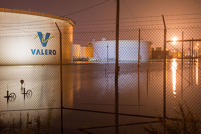 Floodwaters from Hurricane Harvey surround storage tanks at the Valero refinery in Port Arthur, Texas, on September 1. Petrochemical plants and refineries like this one released millions of pounds of toxic pollution into the air as they shut down and rebooted in the wake of the storm. (Photo: Alex Glustrum)