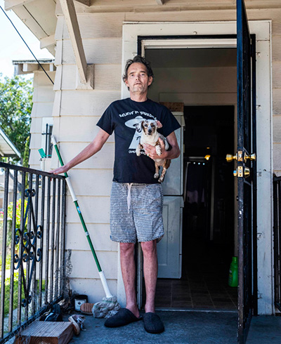 Shawn Pruett, shown in April, rented the Butler family home in South Los Angeles after it was sold to a company founded by Tom Barrack, a close friend of President Donald Trump’s. Pruett died of cancer in August. (Photo: Stuart Palley for Reveal)