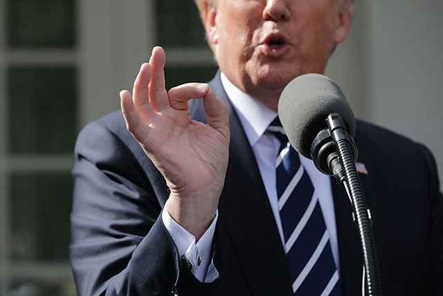 President Donald Trump speaks to reporters in the Rose Garden during a news conference with Senate Majority Leader Mitch McConnell (R-KY) following a lunch meeting at the White House October 16, 2017 in Washington, DC. (Photo: Chip Somodevilla / Getty Images)