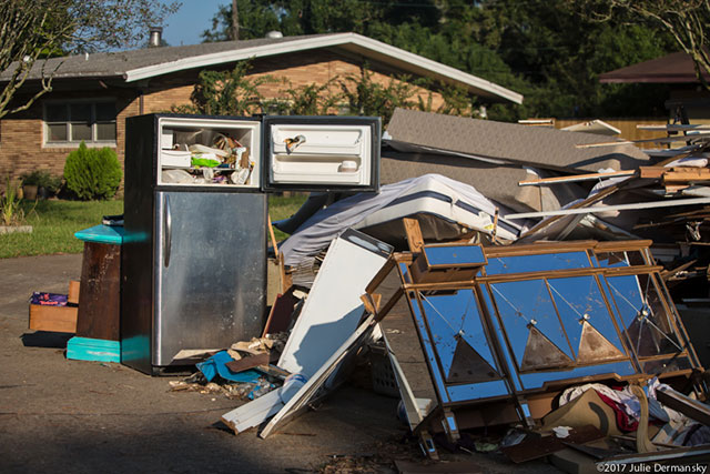 After Hurrican Harvey, storm debris removal is ongoing in Port Arthur, Texas. Some streets have been cleared of debris but many have not. (Photo: Julie Dermansky)