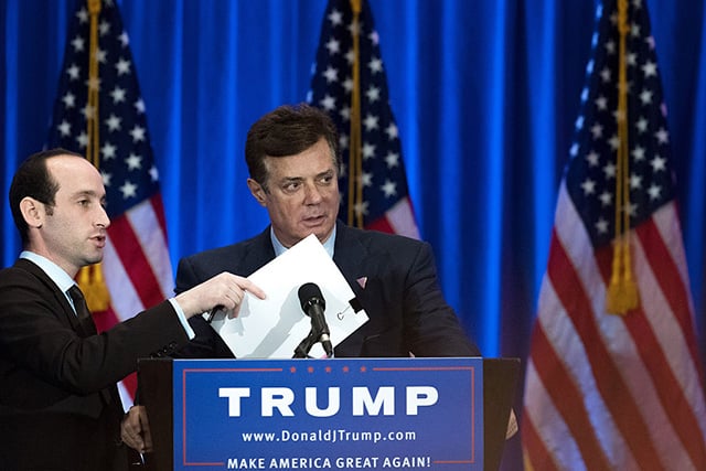 Campaign chairman Paul Manafort checks the podium before Republican Presidential candidate Donald Trump speaks during an event at Trump SoHo Hotel, June 22, 2016, in New York City. Former Trump campaign manager Paul Manafort and his ex-business partner Rick Gates turned themselves in to federal authorities Monday in relation to the special counsel's investigation into Russian influence in the 2016 election. (Photo: Drew Angerer / Getty Images)