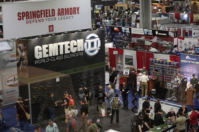 National Rifle Association members visit exhibitor booths at the 146th NRA Annual Meetings & Exhibits on April 29, 2017 in Atlanta, Georgia. With more than 800 exhibitors, the convention is the largest annual gathering for the NRA's more than 5 million members. (Photo by Scott Olson/Getty Images)