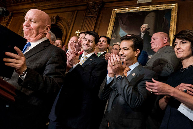 Speaker of House Paul Ryan along with his leadership, Republican Conference Chairperson Cathy McMorrison-Rogers, right, and House Ways and Means Chairman Kevin Brady, left, celebrate the passage of the House Tax Bill, voted 227-205 along party lines to approve the bill, on Capitol Hill in Washington, DC Thursday November 16, 2017. (Photo by Melina Mara / The Washington Post via Getty Images)