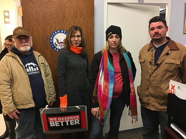 On Monday, December 4, activists affiliated with the Maine People's Alliance occupied the office of Sen. Susan Collins, protesting her vote in favor of a tax bill that would gut Medicare and Social Security. (Photo: Sarah Bigney)