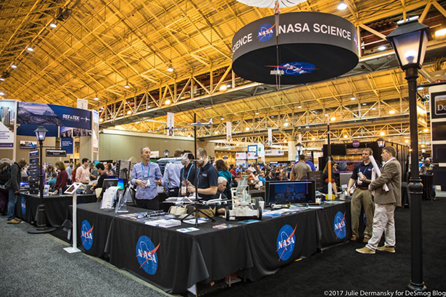 NASA’s Exhibit at the 2017 American Geophysical Union Meeting in New Orleans. Some of the items given out by NASA were made in China despite Trump’s Buy in America executive order. (Photo: Julie Dermanksy)