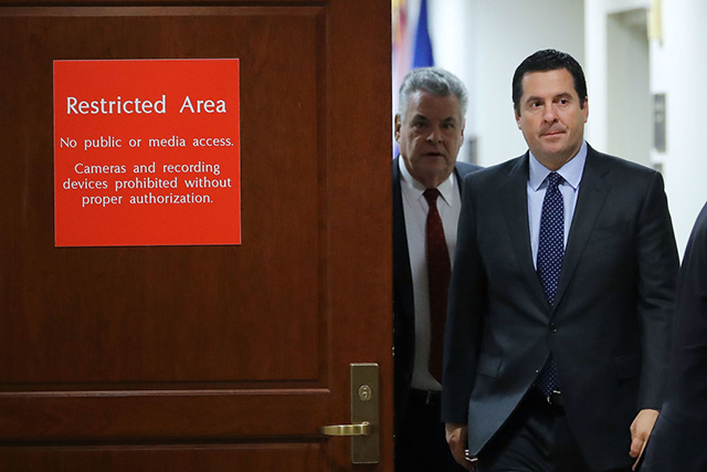 House Intelligence Committee Chairman Devin Nunes (2nd left) and Rep. Peter King leave the committee's secure meeting rooms in the basement of the US Capitol House Visitors Center February 6, 2018, in Washington, DC. The committee voted unanimously Monday night to send a Democratic memo rebutting claims of bias in the Russia investigation FISA court application to the White House. (Photo: Chip Somodevilla / Getty Images)