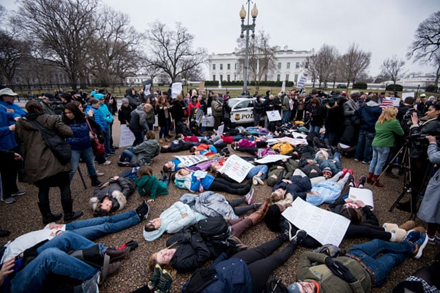 Washington, DC, area students and supporters protest against gun violence with a lie-in outside of the White House on Monday, Feb. 19, 2018, after 17 people were killed in a shooting at Marjory Stoneman Douglas High School in Parkland, Florida, last week. (Photo: Bill Clark / CQ Roll Call)