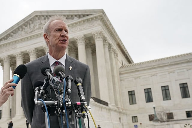 Governor of Illinois Bruce Rauner speaks to members of the media in front of the US Supreme Court after a hearing on February 26, 2018 in Washington, DC. Rauner signed an executive order to stop fair-share fees in his state, a move that prompted lawsuits from a number of unions. (Photo: Alex Wong / Getty Images)