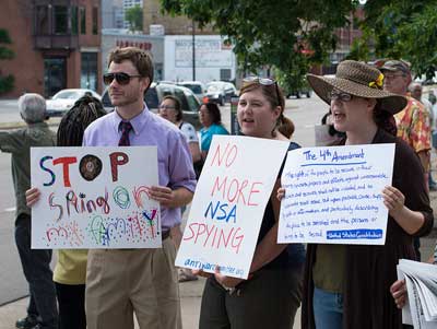 Protesters gathered outside Minnesota Senator Amy Klobuchar's office June 18 to protest National Security Agency surveillance programs. Part of the NSA's program was exposed in 2006 with the help of Communications Worker Mark Klein.