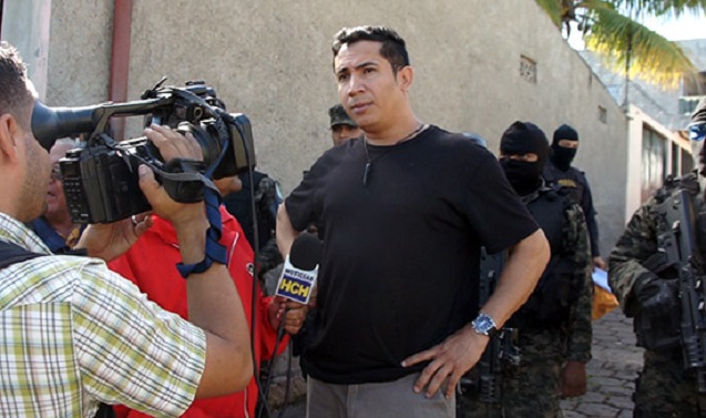 Edwin Espinal giving a declaration to the press, in which he stated that the destruction of his home by military police was part of an ongoing campaign of harassment and political persecution meant to terrorize his family and political activists. (Photo: Jesse Freeston)