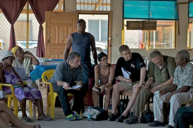 The Common Frontiers Canadian Delegation meet with members of the National Fraternal Organization of Black Hondurans (OFRANEH) to learn about the struggles of the Garífuna to defend their communal coastal land. (Photo: Andalusia Knoll)