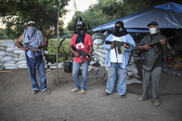 San Juan de los Bananas, located 8 minutes from Apatzingan. This picture shows that the paramilitaries are still prepared to take that city, a stronghold of the Knights Templar. This is one of the most important places of the gurpos autodefenza intend to take, since this is where the Templarios' power is concentrated. (Photo: Heriberto Paredes of Subversiones media. Reprinted with permission.)