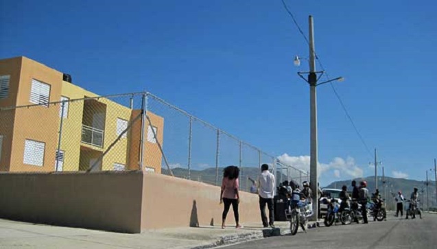 Hopeful applicants outside the recruiting office for the Lumane Casimir Village near Morne à Cabri on September 19, 2013. (Photo: HGW/Marc Schindler Saint-Val)