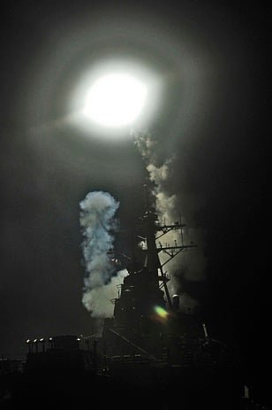 The Arleigh Burke-class guided-missile destroyer USS Barry (DDG 52) launches a Tomahawk missile in support of Operation Odyssey Dawn on March 19, 2011. This was one of approximately 110 cruise missiles fired from US and British ships and submarines that targeted about 20 radar and anti-aircraft sites along Libya’s Mediterranean coast. Joint Task Force Odyssey Dawn is the US Africa Command task force established to provide operational and tactical command and control of US military forces supporting the international response to the unrest in Libya and enforcement of United Nations Security Council Resolution (UNSCR) 1973. (Photo: <a href=