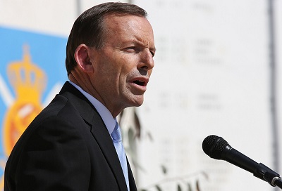 Australian Prime Minister Tony Abbott addresses the crowd at Multi-National Base Tarin Kot on Oct. 28, 2013 in Uruzgan, Afghanistan. (Photo: <a href=