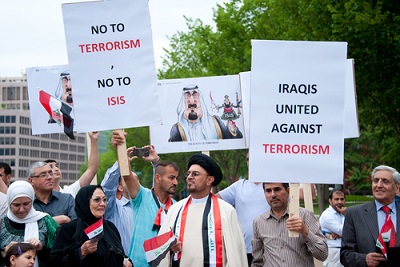 Iraqi demonstrators protested against ISIS in front of the White House in Washington, DC on June 21, 2014. (Photo <a href=