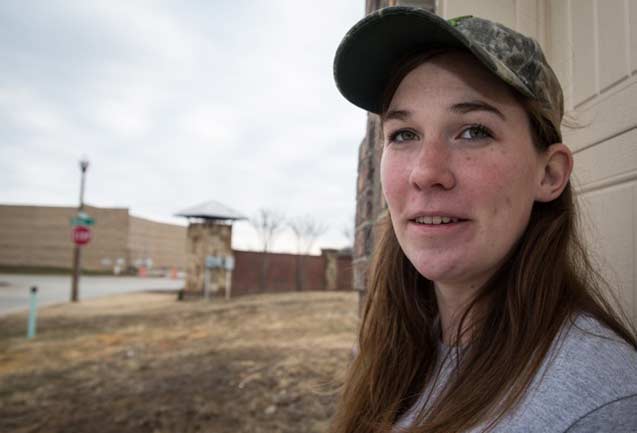 Reagan Stinson, in front of her home in a subdivision at Bonnie Brae Street and Vintage Boulevard, across from an EagleRidge Energy site. Stinson told DeSmogBlog the constant activity at the site made it hard for her to sleep. (Photo: ©2014 Julie Dermansky) 