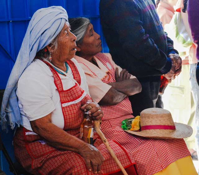 Mixtec women celebrating with local authorities after the completion of a potable water project completed through collective labor. (Photo: Santiago Navarro F.)