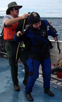 Graduate student Emily Tyner prepares for a chilly dive. (Photo: Brian Bienkowski)