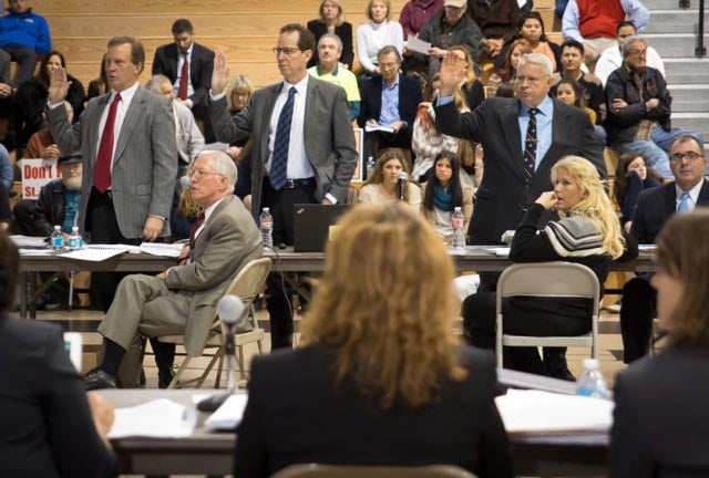 Consultants and lawyers representing Helis Oil being sworn in. ©2014 Julie Dermansky