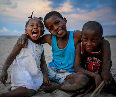 What’s at stake for Honduras’ Garifuna people: Human rights, culture, and land. As throughout much ancestral territory, those who live on this beachfront in Triunfo de la Cruz are targeted for expropriation by a tourism corporation. (Photo: Steve Pavey)