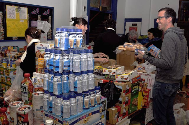 The scene at Occupy Wall Street's Hurricane Sandy relief drop off center at St. Jacobi's church in Sunset Park Brooklyn on the evening of November 1, 2012. Volunteers prepared food and water supplies for flood devastated Rockaway and Staten island amid a steady stream of donors.