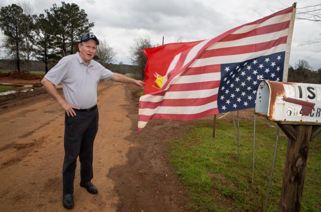 Michael Bishop flies his flag upside down to show his property is under distress while TransCanada installed the Keystone XL pipeline on his land in Douglas, Texas. (Photo: ©2013 Julie Dermansky)