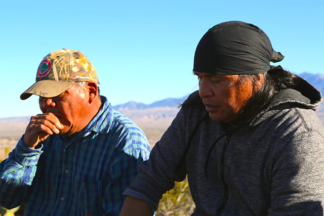 Wendsler Nosie Sr. and other Apache leaders prepare for the journey to Oak Flat by singing religious songs at Old San Carlos. (Roger Hills)