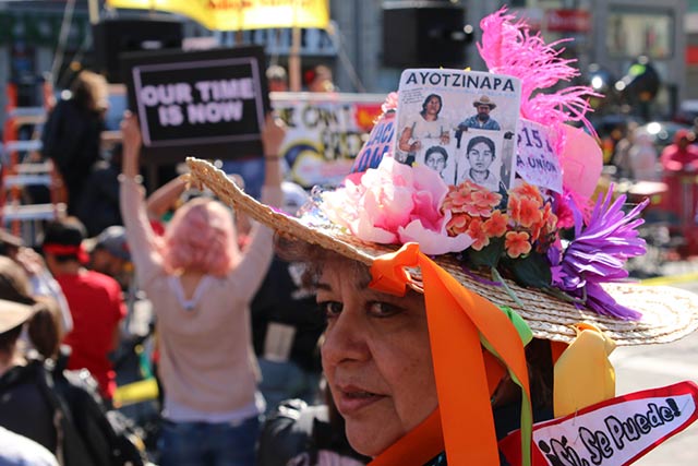 Protesters listen to May Day speakers during a rally in Union Square. (Photo: Matt Surrusco)