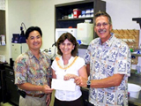 Ania WieczorekAnia Wieczorek, associate specialist in Biotechnology, Biotechnology Outreach Program at CTAHR accepts a $20,000 grant from Monsanto in this photo. Here she is shown with two of Monsanto’s community affairs managers in Hawaii: Alan Takemoto, left, and Paul Koehler, right.Ania WieczorekAnia Wieczorek, associate specialist in Biotechnology, Biotechnology Outreach Program at CTAHR accepts a $20,000 grant from Monsanto in this photo. Here she is shown with two of Monsanto’s community affairs managers in Hawaii: Alan Takemoto, left, and Paul Koehler, right.