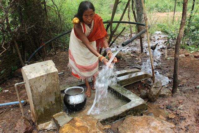 A major reason for the Dongria Kondh’s opposition to Vedanta Resource’s bauxite mining in the Niyamgiri Mountains in the eastern Indian state of Odisha was that it would destroy their numerous perennial hill streams. Here, a tribal girl washes at a pipe that gushes fresh water 24 hours a day. (Photo: Manipadma Jena/IPS)