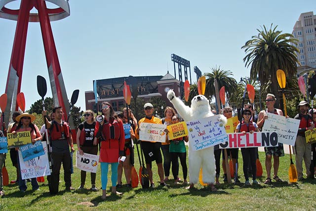 Concerned citizens and environmental groups circled outside a major San Francisco landmark, the AT&T Park, to protest President Obama's decision to approve Arctic drilling in the formidable Chukchi Sea. (Photo: Rucha Chitnis)