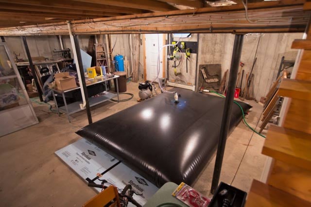 Water bladder in the Chichura family’s basement supplied by Cabot Oil. (Photo: ©2015 Julie Dermansky)
